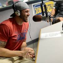 Lions tight end Tony Scheffler smiles as he jokes around on the air during the Mott Takeover at 1050 WTKA on Friday, May 17, 2013. Melanie Maxwell I AnnArbor.com